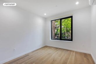 221 E 117th St in New York, NY - Building Photo - Building Photo