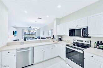 6245 Wilshire Pines Cir in Naples, FL - Building Photo - Building Photo