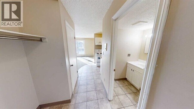 10028-10105 105 Ave in Grande Prairie, AB - Building Photo - Building Photo