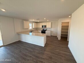 8481 W Reventon Dr in Arizona City, AZ - Building Photo - Building Photo