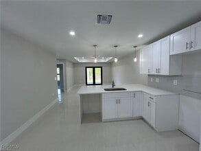 405-407 Chalet Ave S in Lehigh Acres, FL - Building Photo - Building Photo
