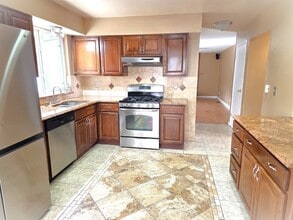 16456 E Kentucky Ave in Aurora, CO - Foto de edificio - Building Photo