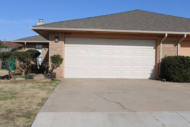 property at 7133 NW 115th St