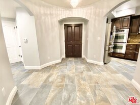 1135 Rexford Dr in Los Angeles, CA - Building Photo