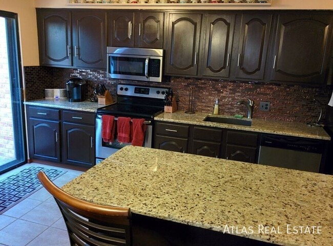 property at 6406 E Bates Ave