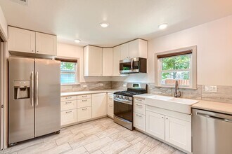 Updated Highland home with mid-century charm in Austin, TX - Building Photo - Building Photo