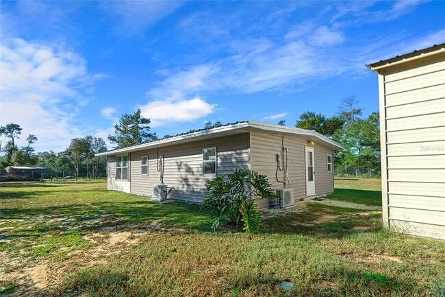 15400 NE 234th Ln in Fort Mc Coy, FL - Building Photo - Building Photo