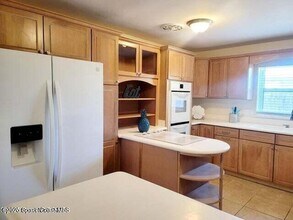 130 Tiki Dr in Merritt Island, FL - Foto de edificio - Building Photo