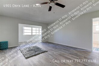 4901 Onyx Ln-Unit -#204 in New Port Richey, FL - Building Photo - Building Photo