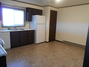 704 Miller Ct, Unit C in Rawlins, WY - Building Photo - Building Photo
