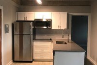 Full Kitchen - The Tower on Ryan Park Apartamentos in Mobile, Alabama