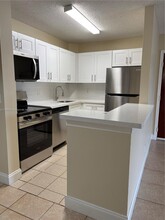 10717 Cleary Blvd, Unit 203 in Plantation, FL - Building Photo - Building Photo
