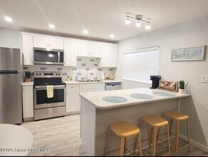 7605 Ridgewood Ave in Cape Canaveral, FL - Building Photo - Building Photo
