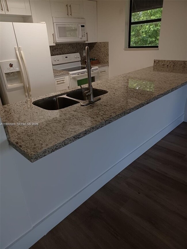 property at 16220 NW 2nd Ave