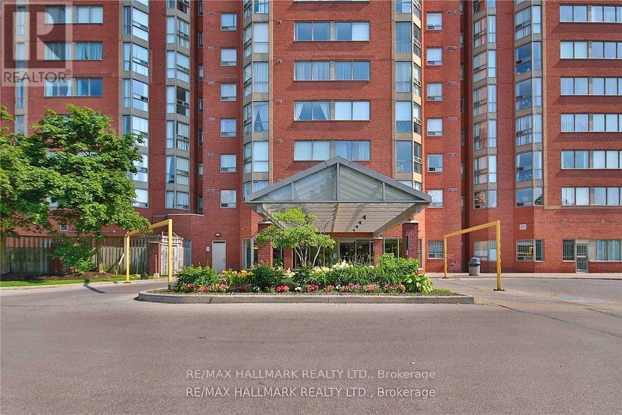 306-2466 EGLINTON Ave in Toronto, ON - Building Photo