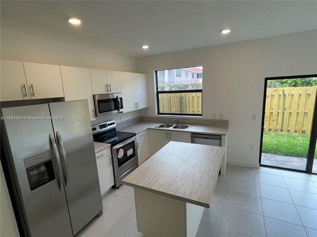 property at 883 NE 211th St