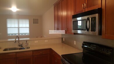 7120 Simms St-Unit -203 in Arvada, CO - Building Photo - Building Photo