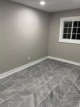 105 S 32nd St in Wyandanch, NY - Foto de edificio - Building Photo