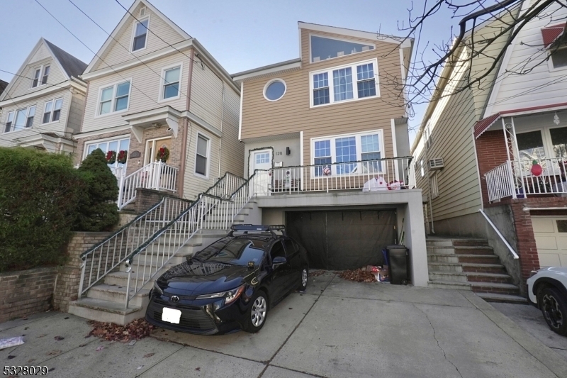 128 W 45th St in Bayonne, NJ - Building Photo