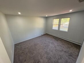50 Eisenhower Ave, Unit 1 in Brentwood, NY - Building Photo - Building Photo