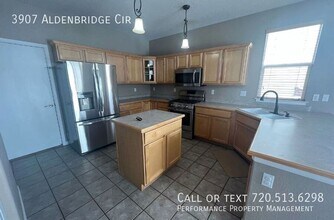 3907 E Aldenbridge Cir in Littleton, CO - Building Photo - Building Photo