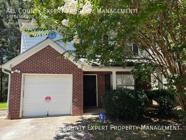 7066 Ravenwood Ln in Stonecrest, GA - Foto de edificio - Building Photo