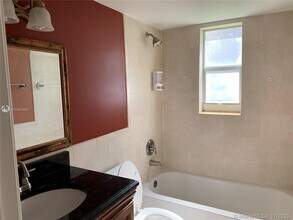 100 Village Green Cir E-Unit -101 in Palm Springs, FL - Building Photo - Building Photo