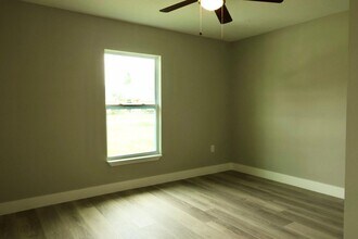 138 Guava Pass in Ocklawaha, FL - Building Photo - Building Photo