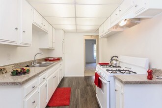 Camino Pueblo and El Rancho Apartment Homes in Placentia, CA - Building Photo - Building Photo