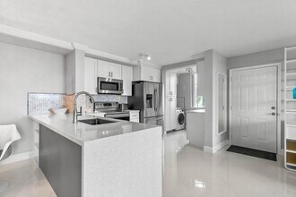 180 Yacht Club Way in Hypoluxo, FL - Building Photo - Building Photo