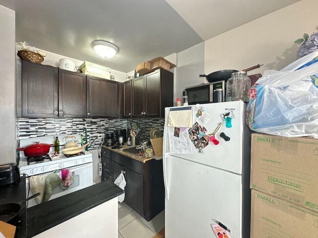 5670 N Ridge Ave, Unit S4 in Chicago, IL - Building Photo - Building Photo