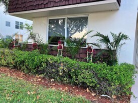 2601 S Palm Aire Dr, Unit 112 in Pompano Beach, FL - Building Photo