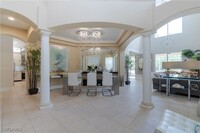 5655 Lago Villaggio Way, Unit 107 in Naples, FL - Building Photo - Building Photo