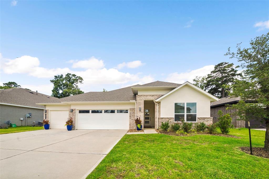 14010 Juniper Pt Ln in Conroe, TX - Building Photo