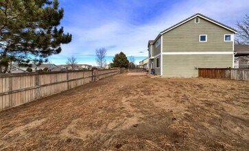 19312 E 58th Pl in Aurora, CO - Building Photo - Building Photo