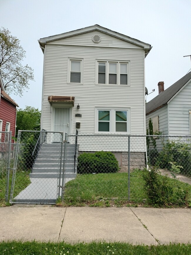 property at 10619 S Perry Ave