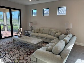 11909 Sacra Pl in Ft. Myers, FL - Foto de edificio - Building Photo