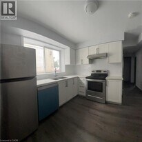 245 Mohawk Rd E in Hamilton, ON - Building Photo