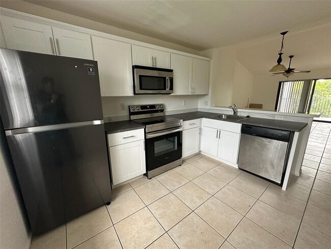 10115 W Sunrise Blvd, Unit 306 in Plantation, FL - Building Photo - Building Photo