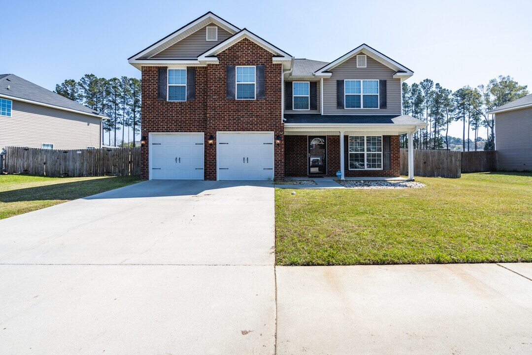 141 Powers Dr in Midway, GA - Building Photo