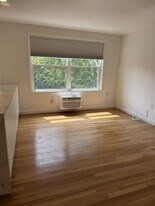 7630 Tomlinson Ave, Unit MacArthur Condominiums in Cabin John, MD - Building Photo