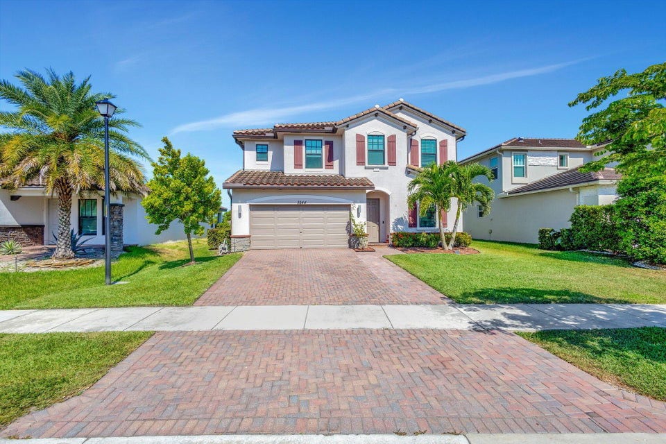 3244 Dunning Dr in Royal Palm Beach, FL - Building Photo