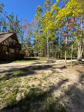 6848 Whispering Pines Dr in Gaylord, MI - Building Photo - Building Photo