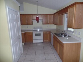 4210 SW Utterback St in Port St. Lucie, FL - Building Photo - Building Photo
