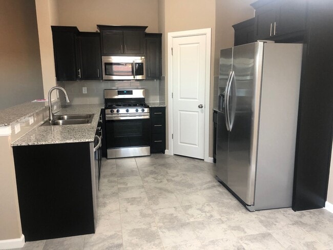 property at 13539 N 130th E Ave