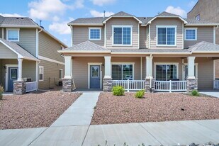 Modern Townhome with Central A/C, 2-Car Ga in Colorado Springs, CO - Building Photo