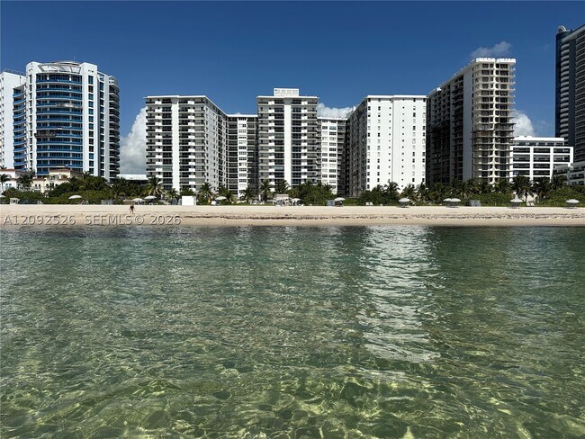 property at 6039 Collins Ave