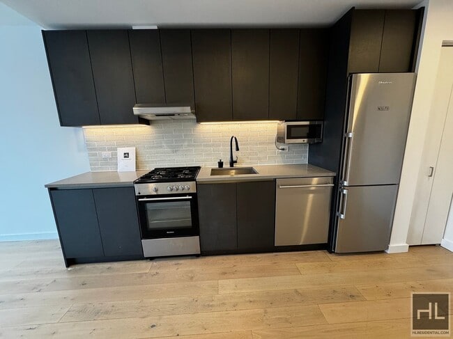 Beautiful Studio Apartment In Flushing! $2 in Queens, NY - Building Photo - Building Photo