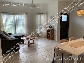 1594 Coastal Pl in Dunedin, FL - Building Photo - Building Photo