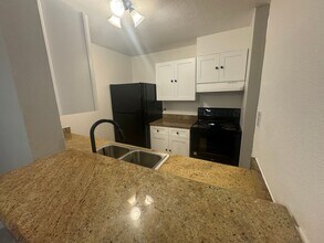 2281 S Vaughn Way in Aurora, CO - Building Photo - Building Photo